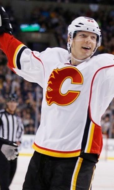 Chad Johnson makes 35 saves, Flames beat Bruins 2-1
